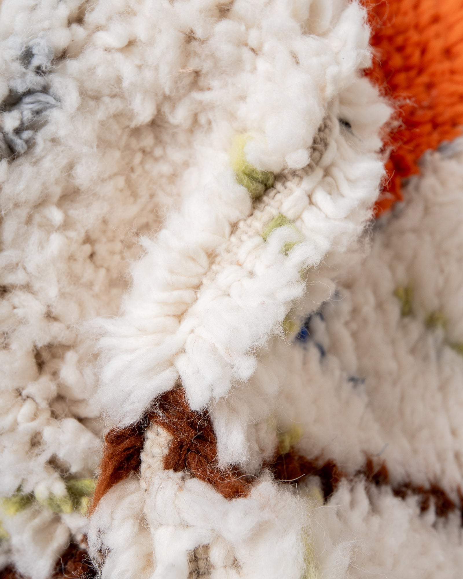 Modern, designer, handcrafted Berber rug from Morocco. Beniourain carpet with beautiful colours and patterns and fluffy wool texture.